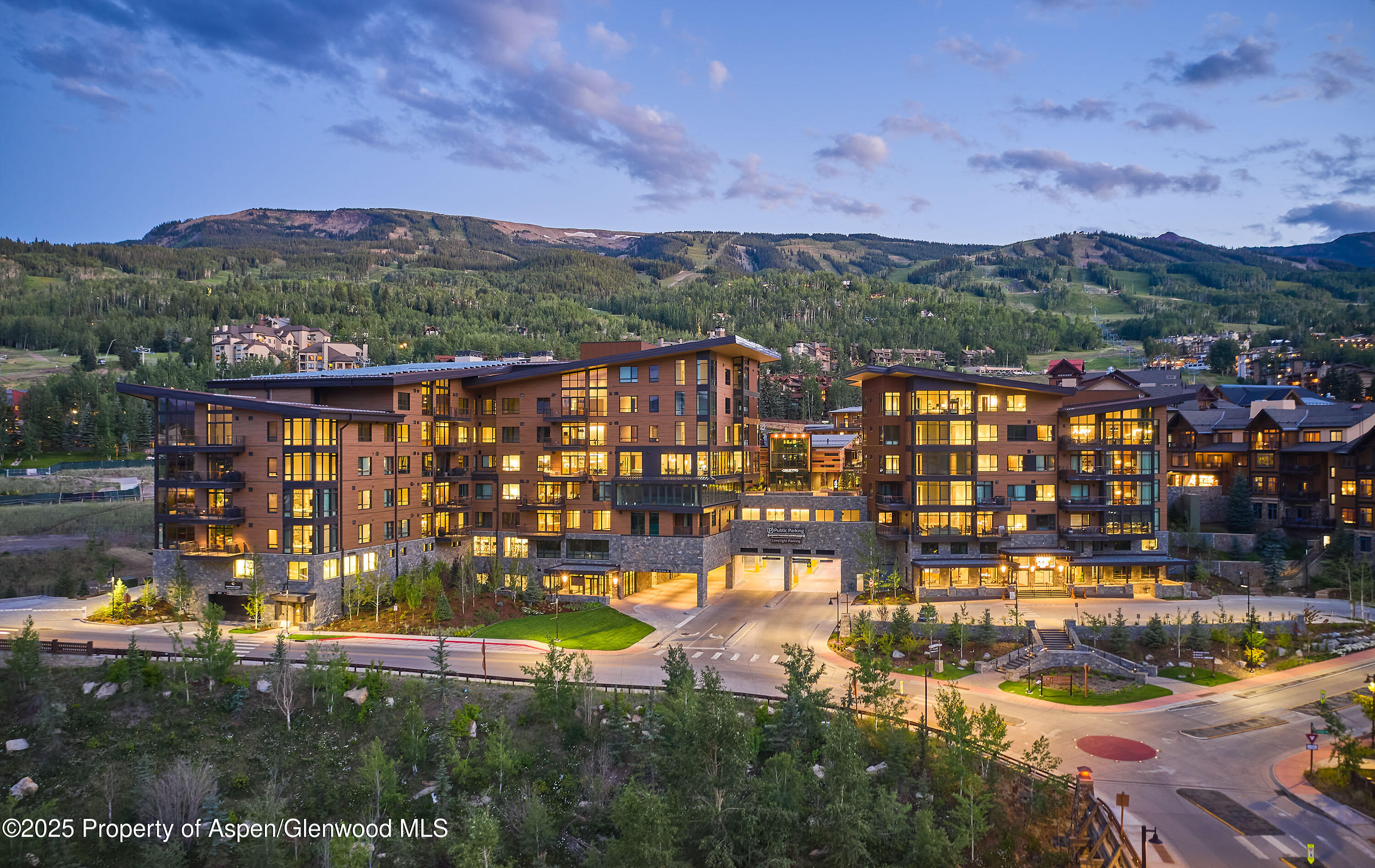 77 Wood Road, Unit 30610 Snowmass Village, CO 81615 - Photo 6 of 6 a view of a lake with a mountain in the background