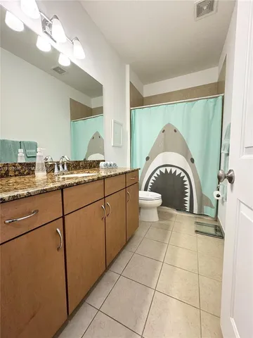 a view of a swimming pool with lounge chair