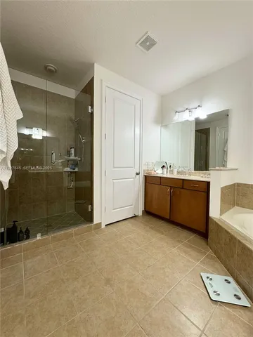 a view of outdoor space with palm trees