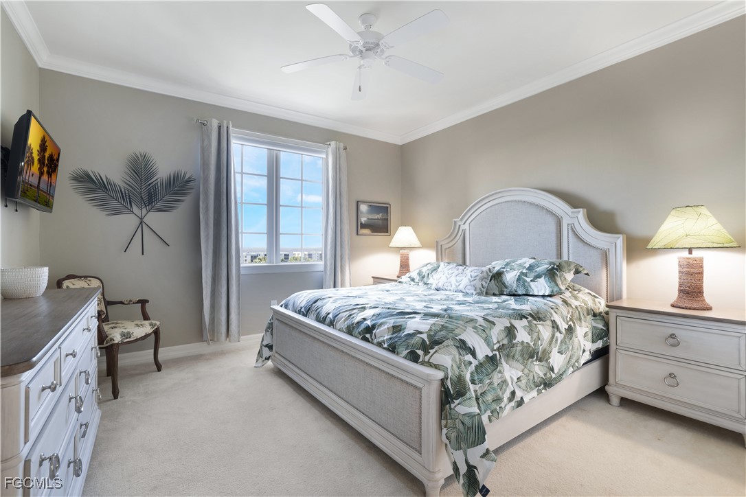 3426 Hancock Bridge Parkway, Unit 704 North Fort Myers, FL 33903 - Photo 17 of 37 a bedroom with a bed and a dresser