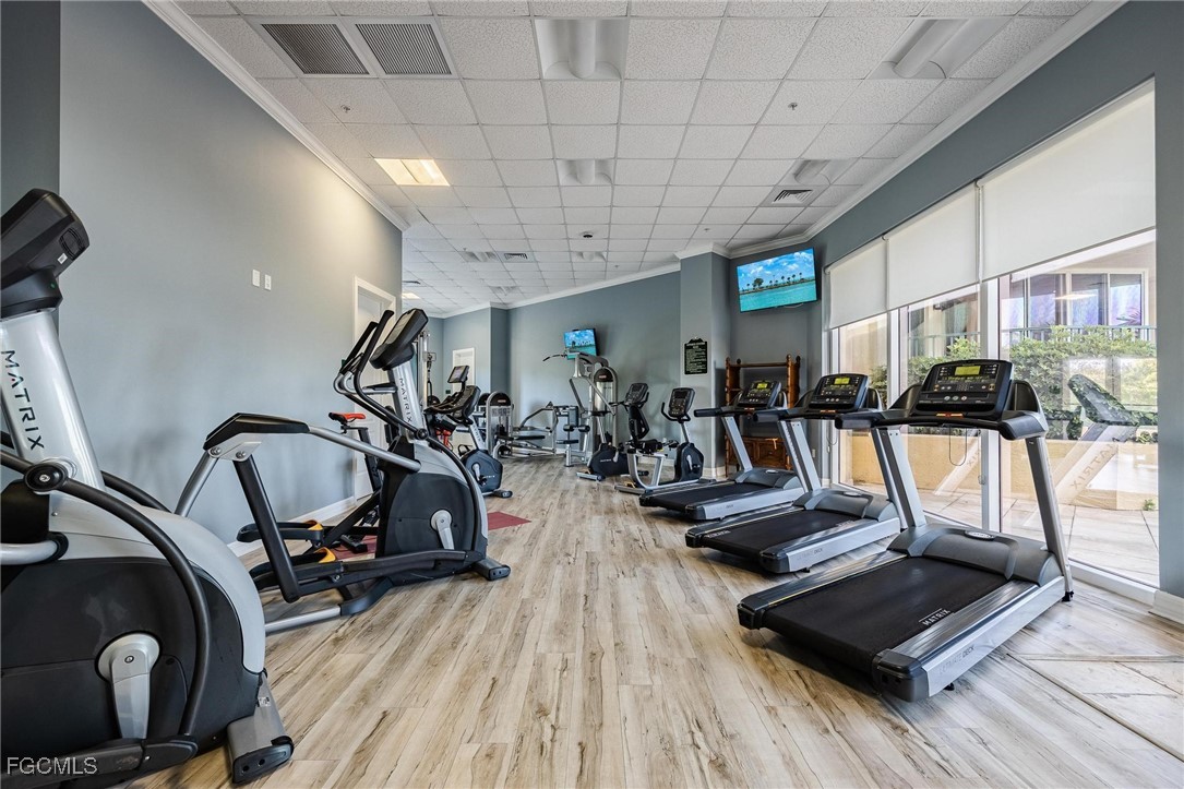 3426 Hancock Bridge Parkway, Unit 704 North Fort Myers, FL 33903 - Photo 25 of 37 a view of a room with gym equipment
