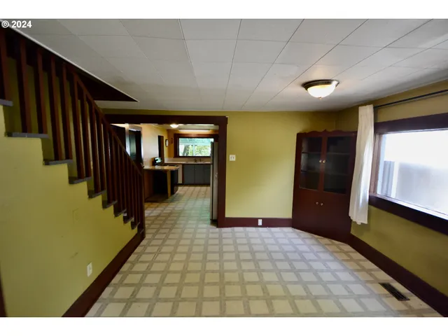 a view of an empty room and window