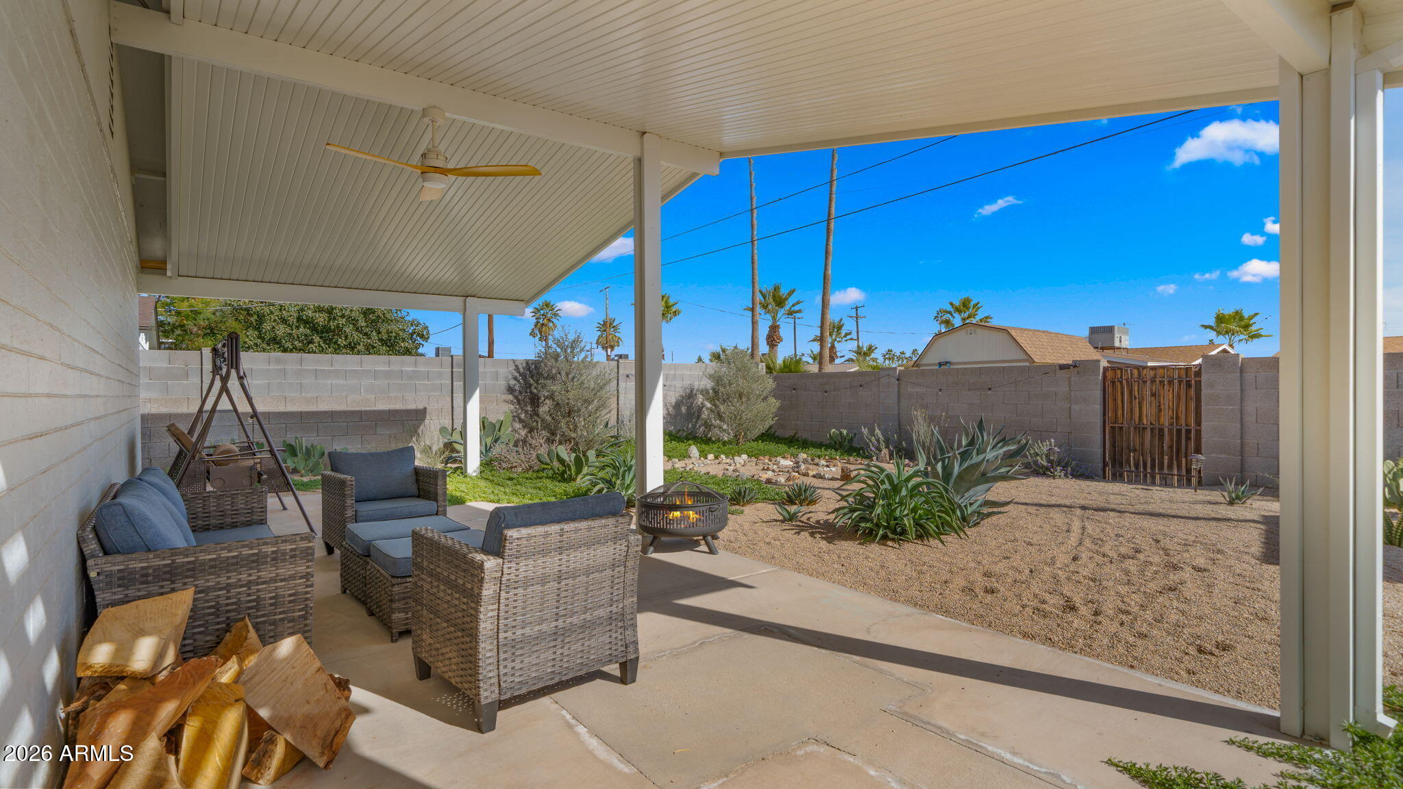 2115 North Normal Avenue Tempe, AZ 85288 - Photo 30 of 38 a view of a couches and table in the patio
