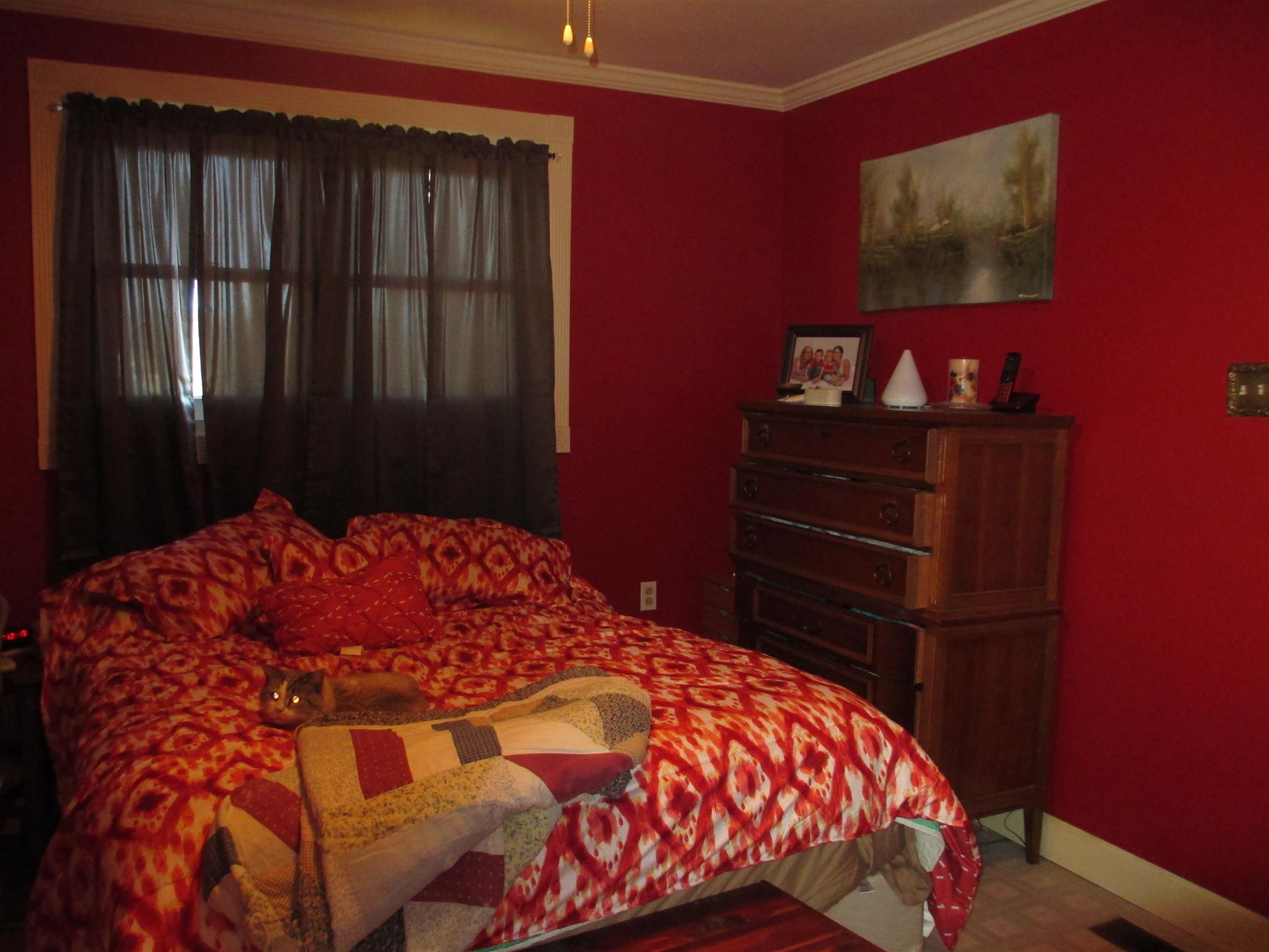 1935 Chicken Road Lebanon, TN 37090 - Photo 13 of 28 a bedroom with a bed and a dresser