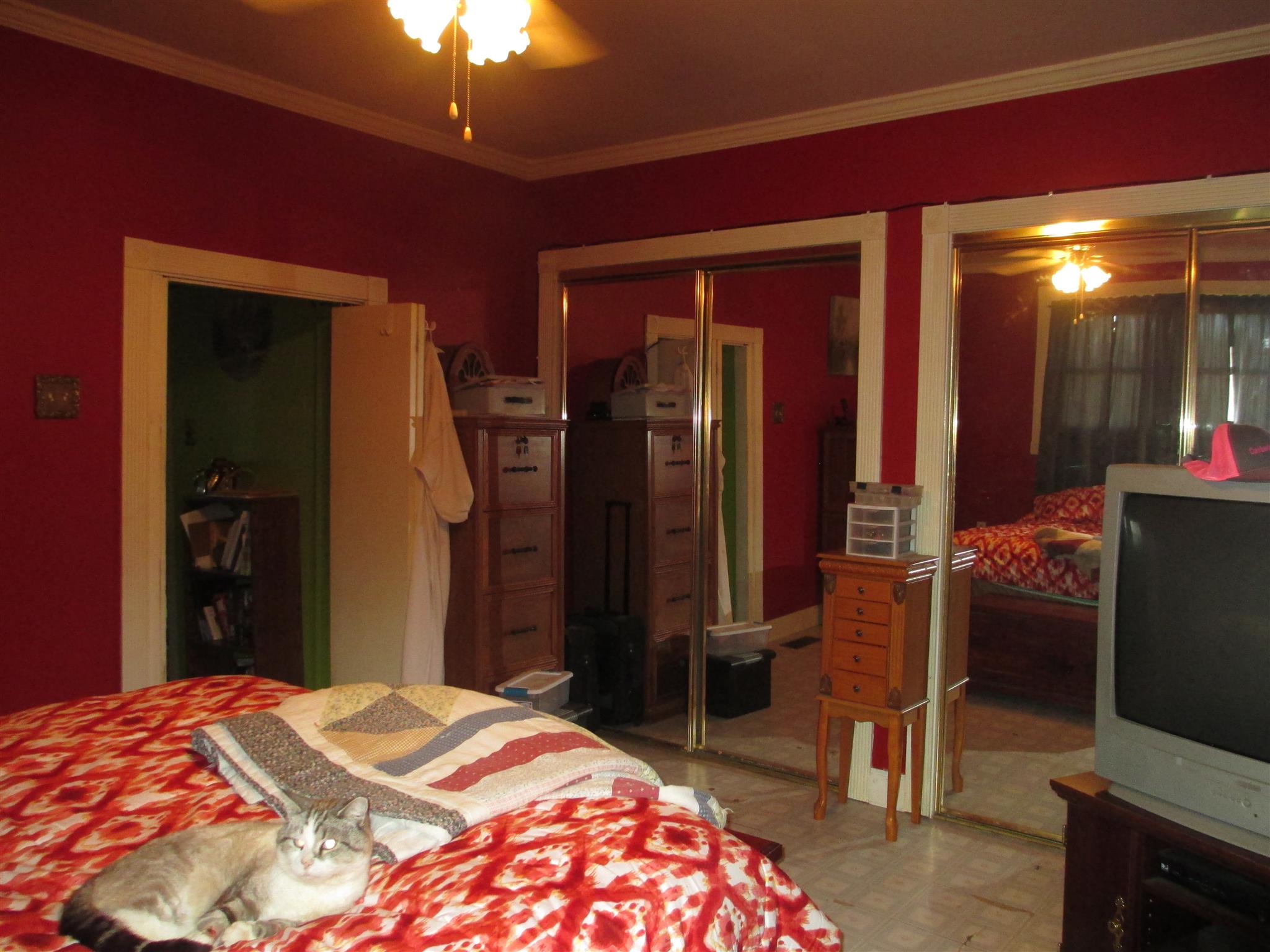 1935 Chicken Road Lebanon, TN 37090 - Photo 14 of 28 a bedroom with a bed and a flat tv screen on dresser