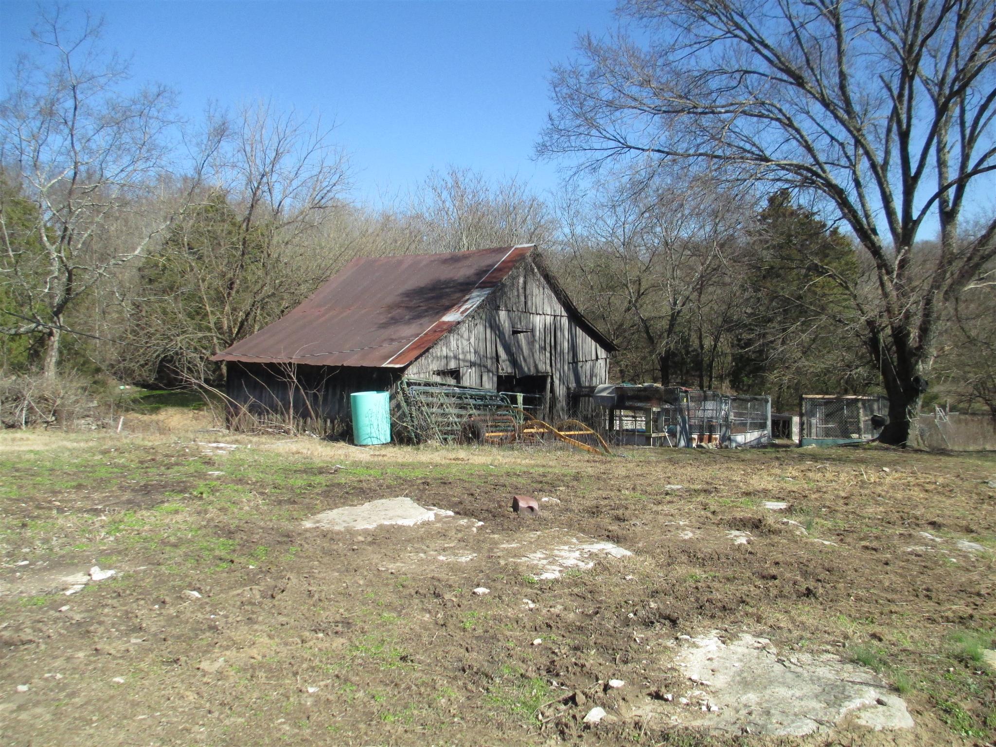 1935 Chicken Road Lebanon, TN 37090 - Photo 22 of 28 a view of a house with a yard