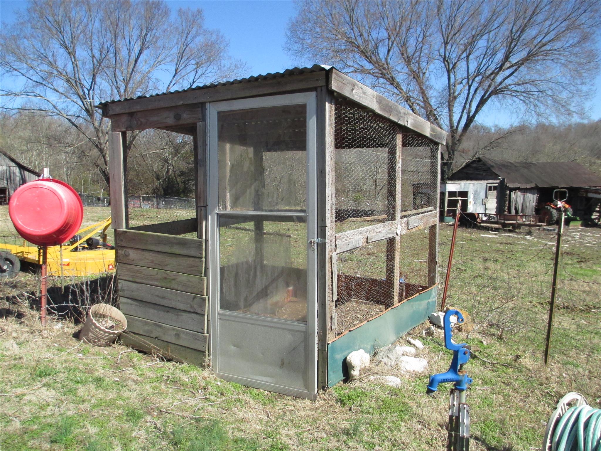 1935 Chicken Road Lebanon, TN 37090 - Photo 24 of 28 a backyard of a house with a table and chairs