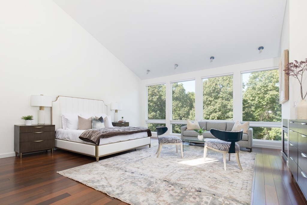 83 McAllister Drive Carlisle, MA 01741 - Photo 13 of 30 a living room with furniture and a large window