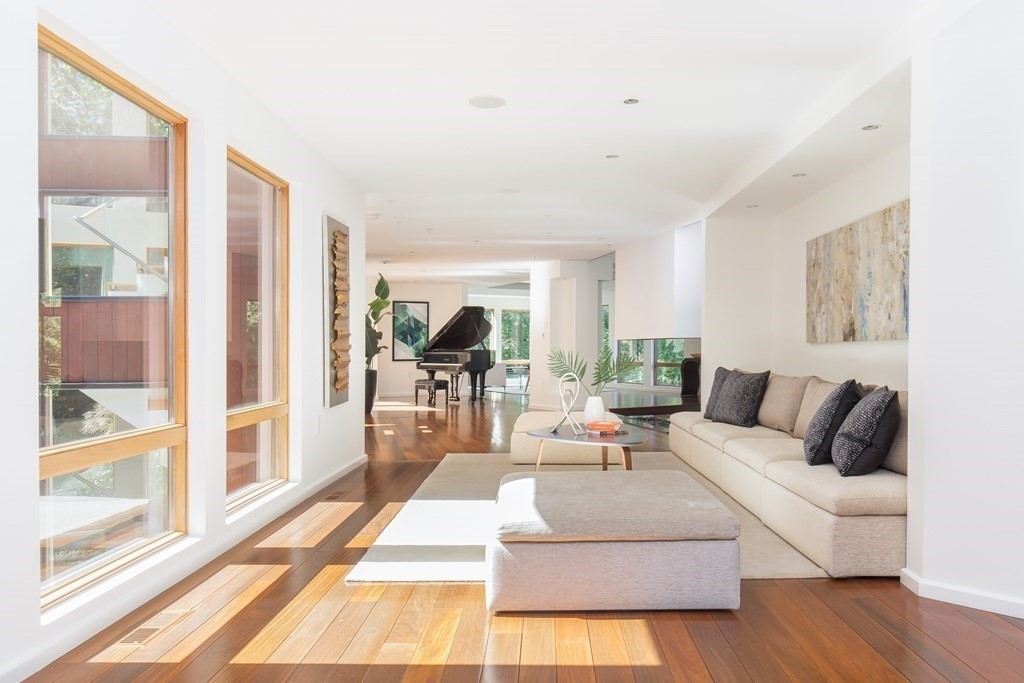 83 McAllister Drive Carlisle, MA 01741 - Photo 7 of 30 a living room with furniture and a large window