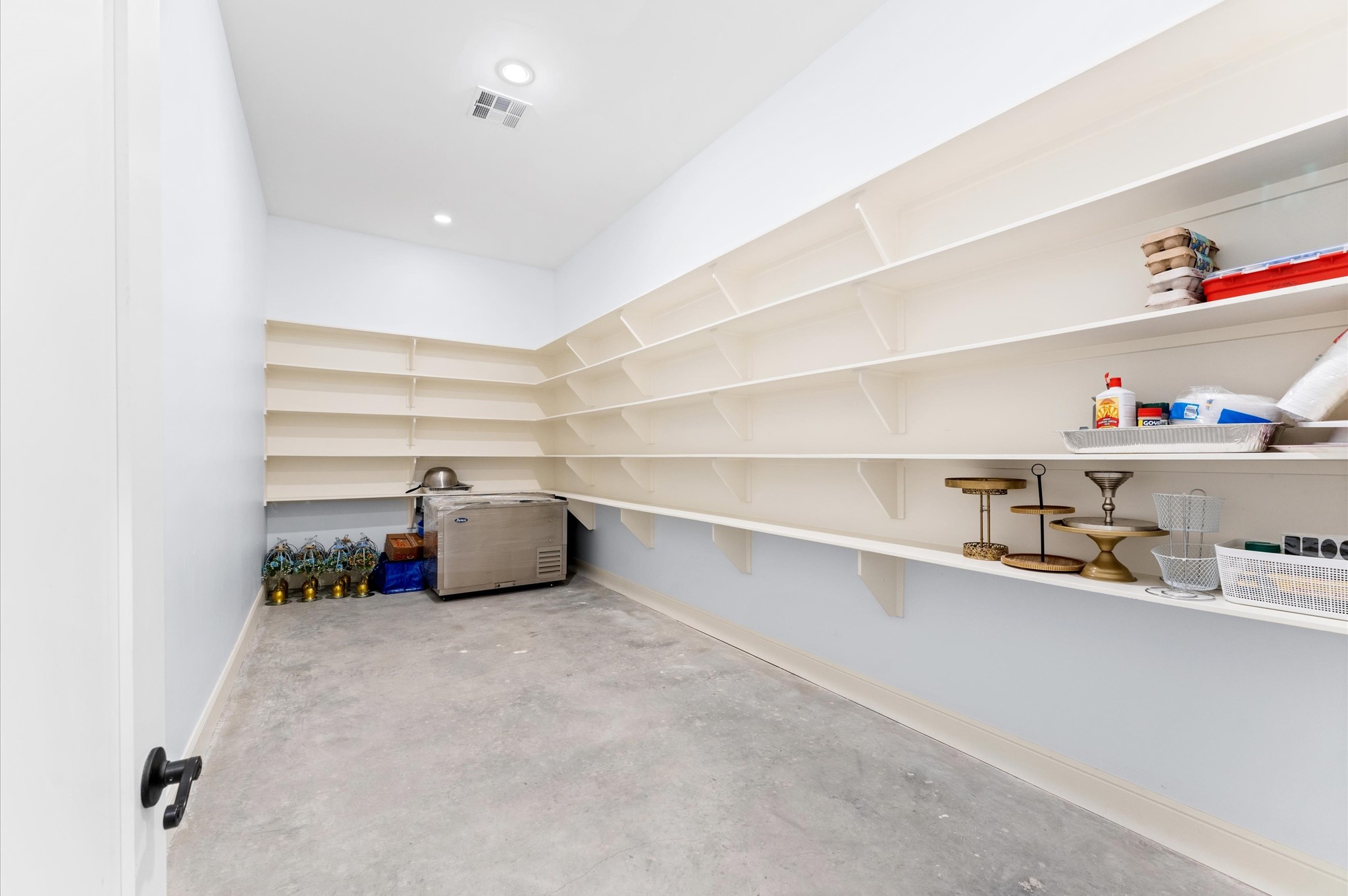 0 Almeda Genoa Road Houston, TX 77053 - Photo 15 of 29 a room with a book shelf and cabinets