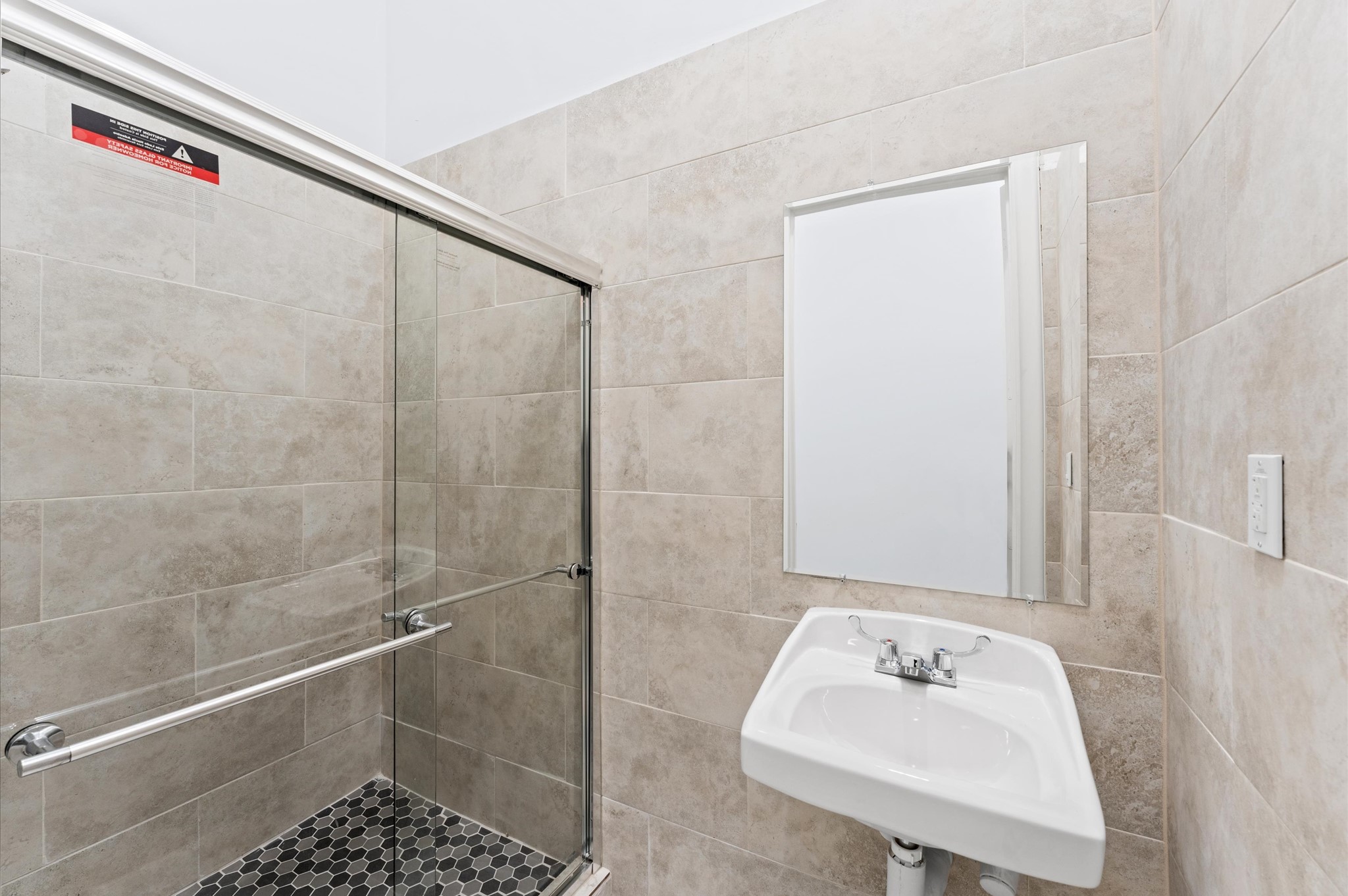 0 Almeda Genoa Road Houston, TX 77053 - Photo 16 of 29 a bathroom with a sink a shower and a mirror