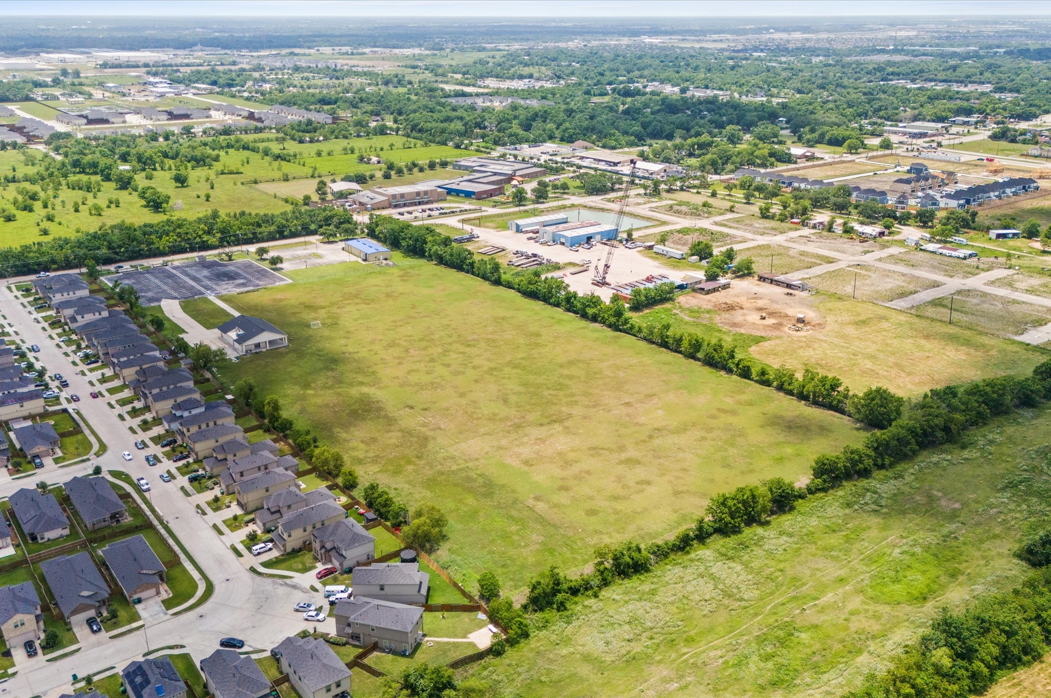 0 Almeda Genoa Road Houston, TX 77053 - Photo 24 of 29 an aerial view of residential houses with outdoor space