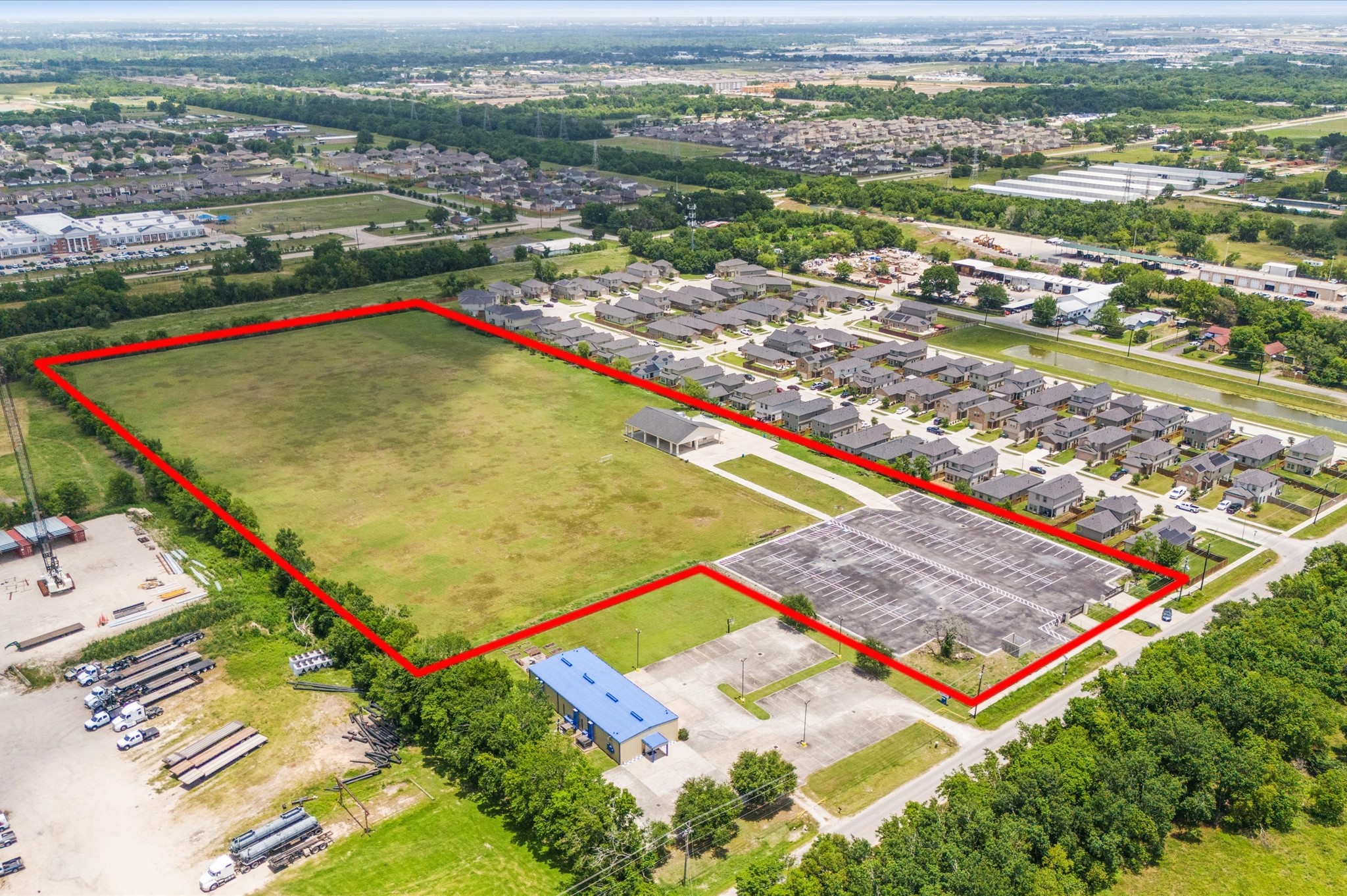 0 Almeda Genoa Road Houston, TX 77053 - Photo 27 of 29 an aerial view of residential houses with outdoor space