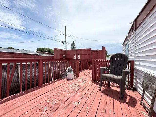 a view of a chairs on the roof deck