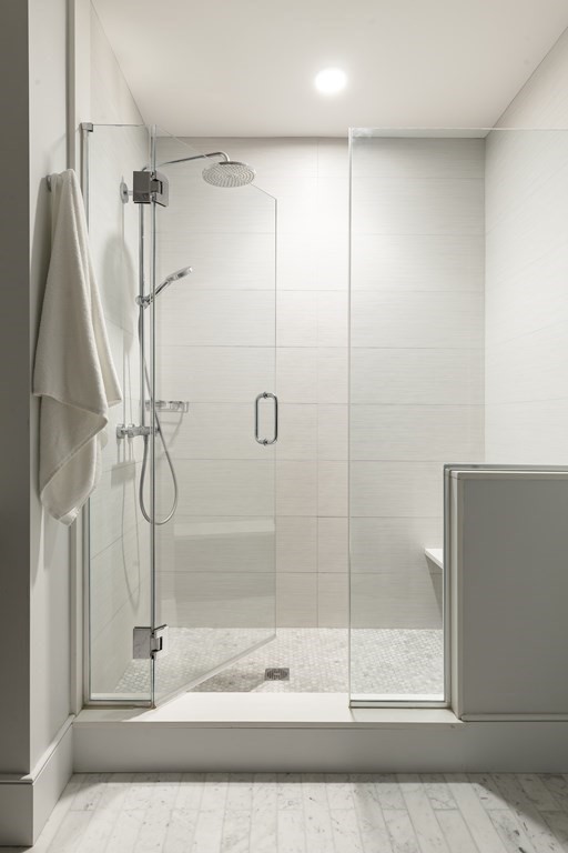 11 Tannery Brook Row, Unit 2 Somerville, MA 02144 - Photo 11 of 17 a bathroom with a shower