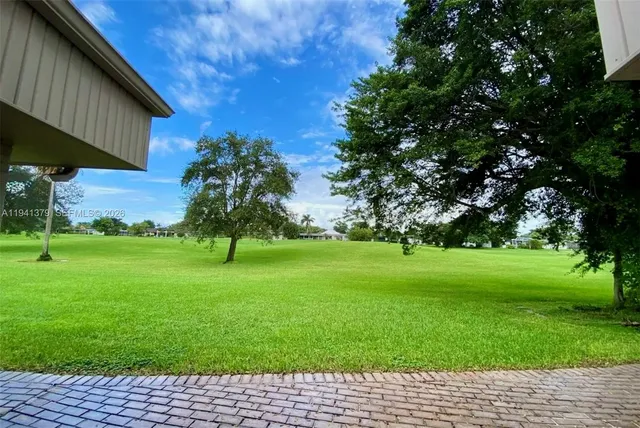 $640,000 | 6105 Royal Poinciana Lane, Tamarac, FL 33319