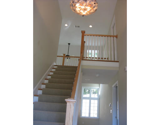 5 Reed Lane Littleton, MA 01460 - Photo 12 of 20 a view of entryway and hall with wooden floor