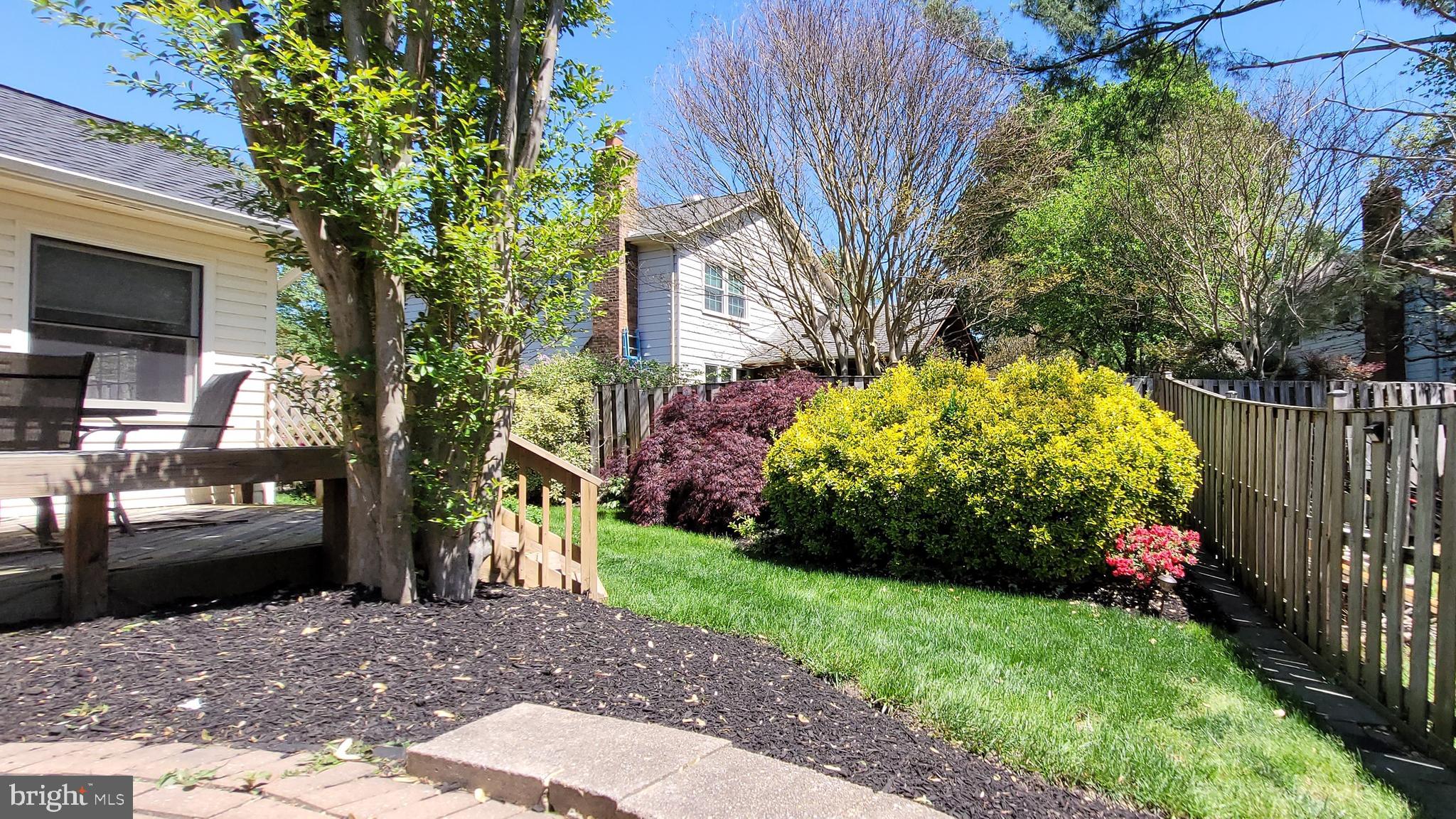4501 Gilbertson Road Fairfax, VA 22032 - Photo 17 of 33 LUSH LAWN, FLOWER BEDS & HARDSCAPE