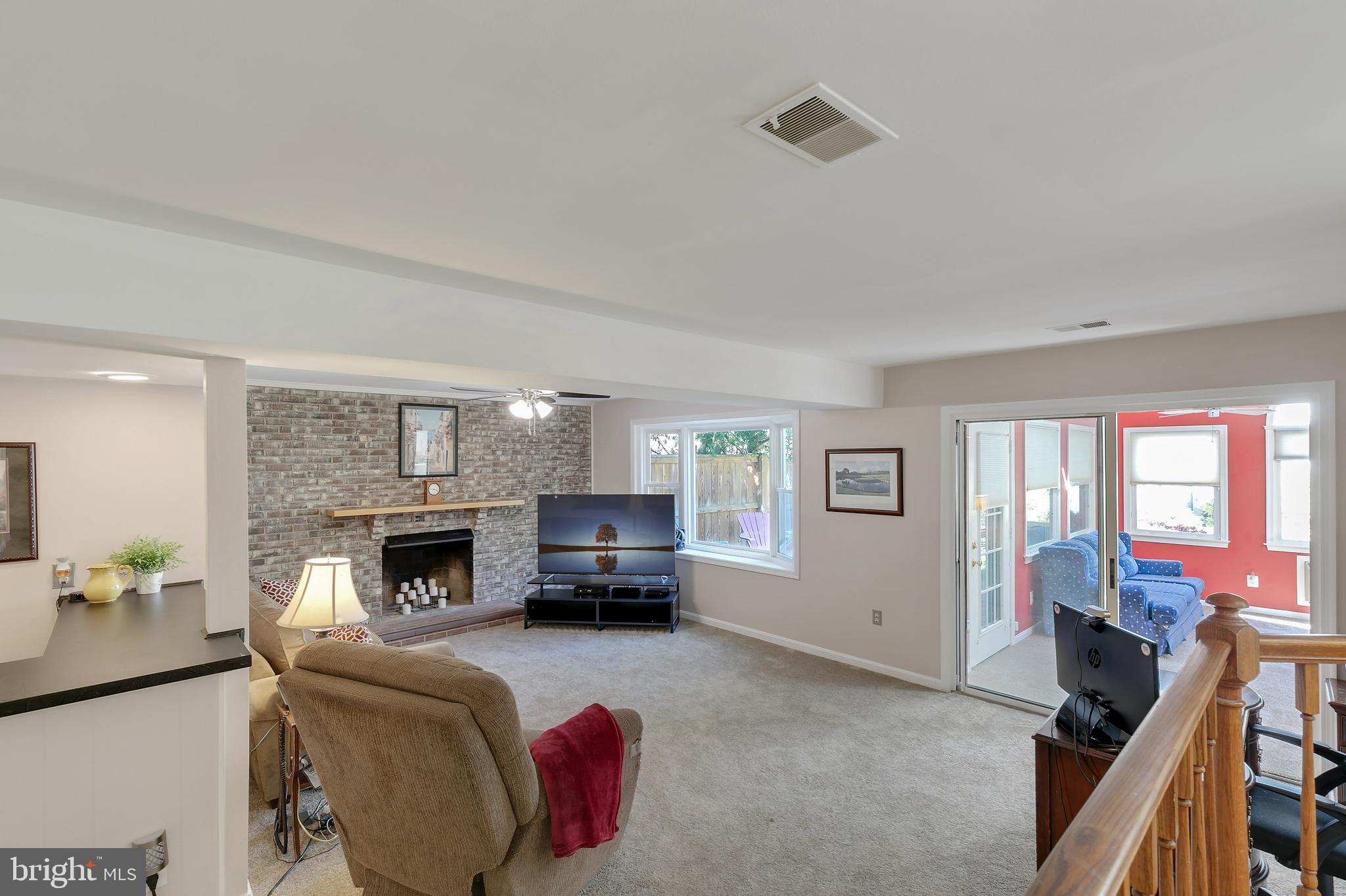 4501 Gilbertson Road Fairfax, VA 22032 - Photo 7 of 33 FAMILY ROOM WITH FIREPLACE AND FUN WET BAR