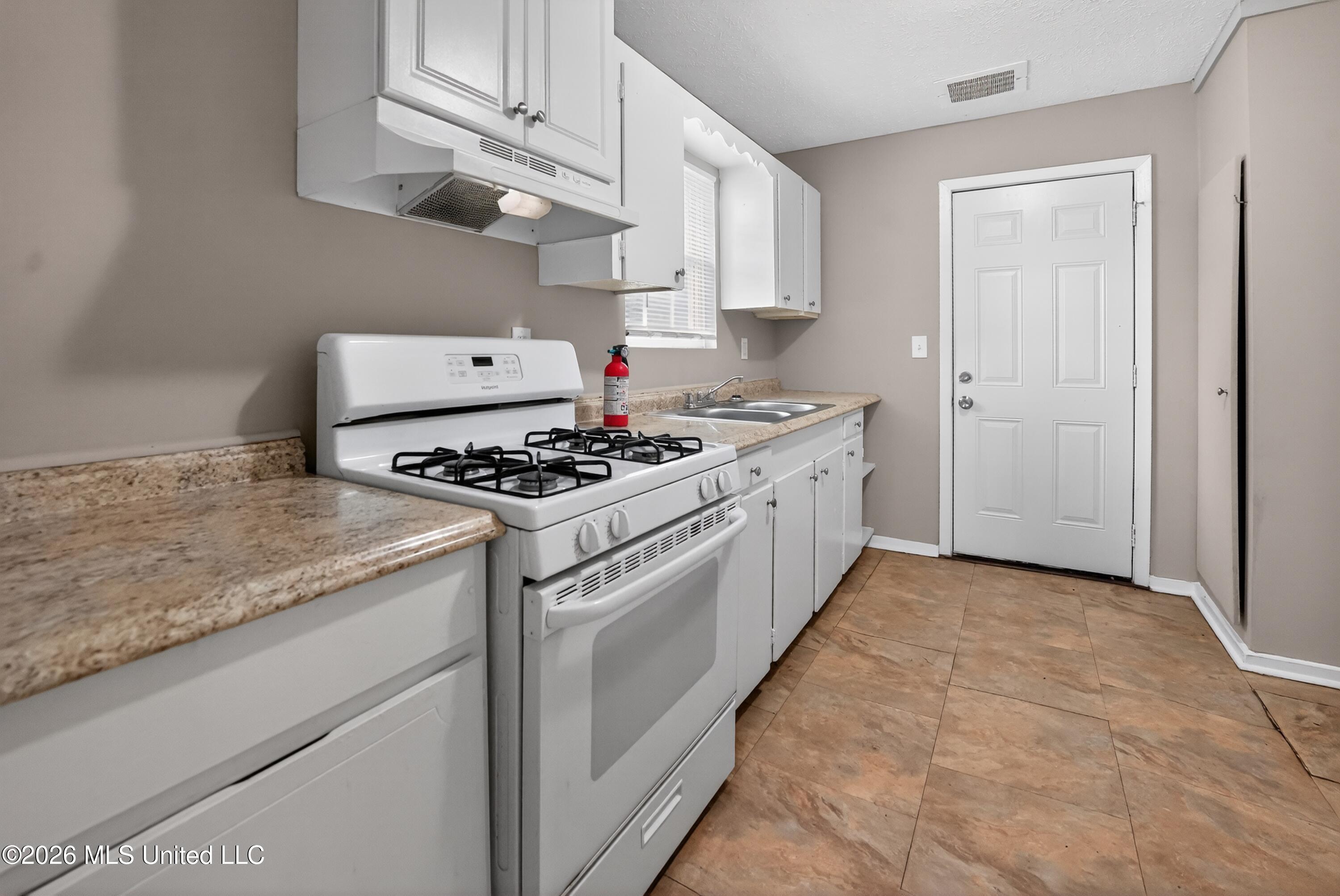 1220 Deeb Street Pearl, MS 39208 - Photo 21 of 32 21_1220_Deeb_St-Kitchen-7363