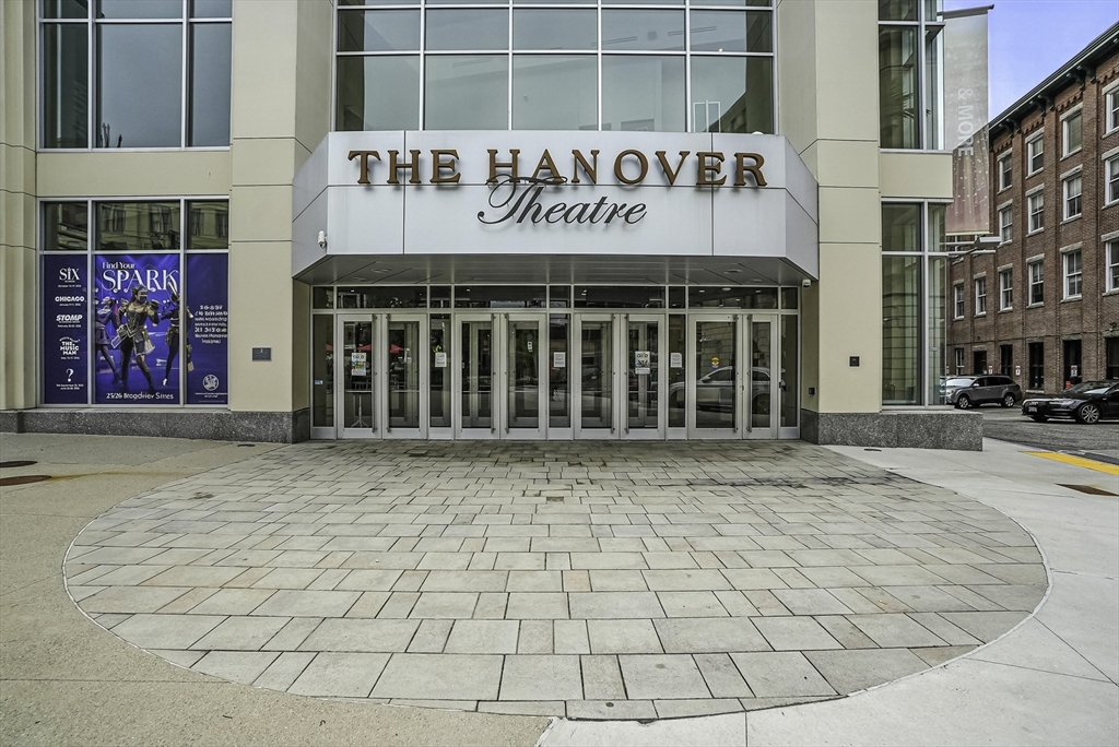 531 Main Street, Unit 410M Worcester, MA 01608 - Photo 25 of 29 a front view of a building with retail shops