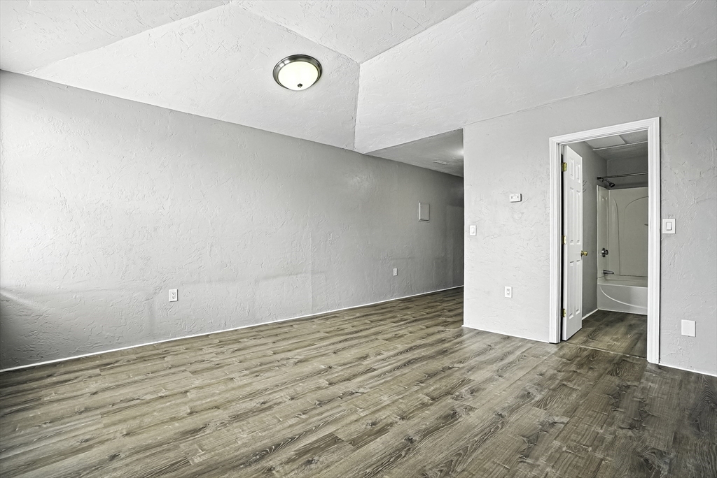 531 Main Street, Unit 410M Worcester, MA 01608 - Photo 10 of 29 wooden floor in a room