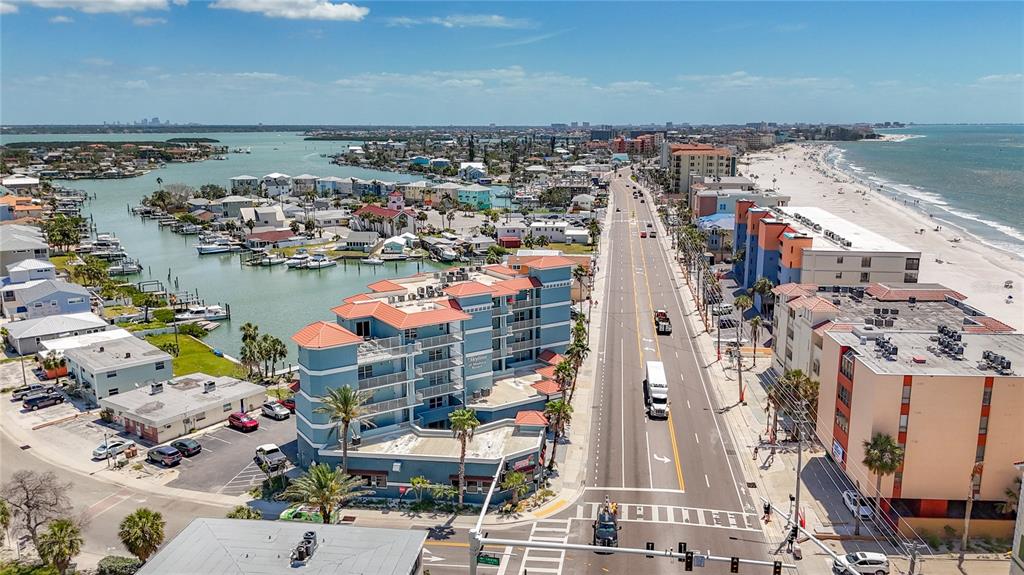 13999 Gulf Boulevard, Unit 501 Madeira Beach, FL 33708 - Photo 2 of 58 an aerial view of a city