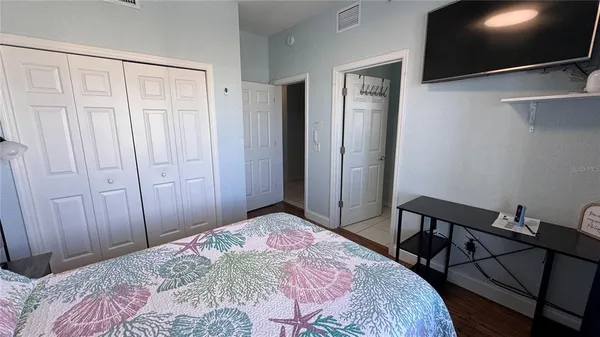 a bathroom with a sink toilet and mirror