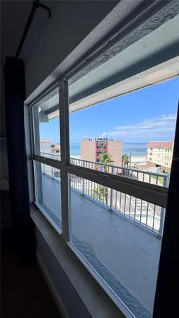 a bathroom with a toilet and shower