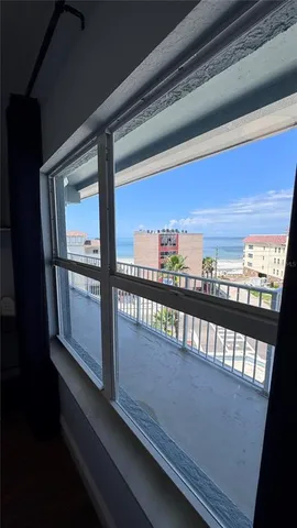 a bathroom with a toilet and shower