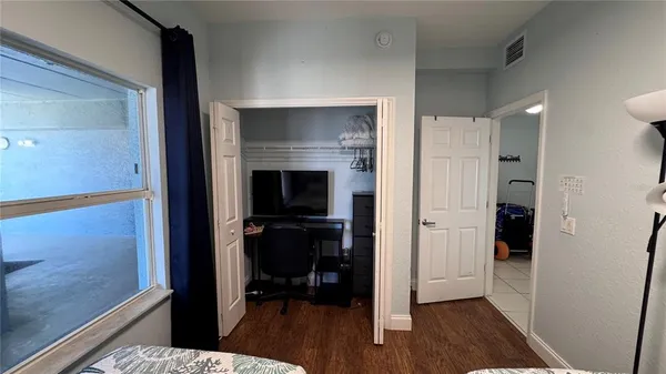 an aerial view of a house with a swimming pool