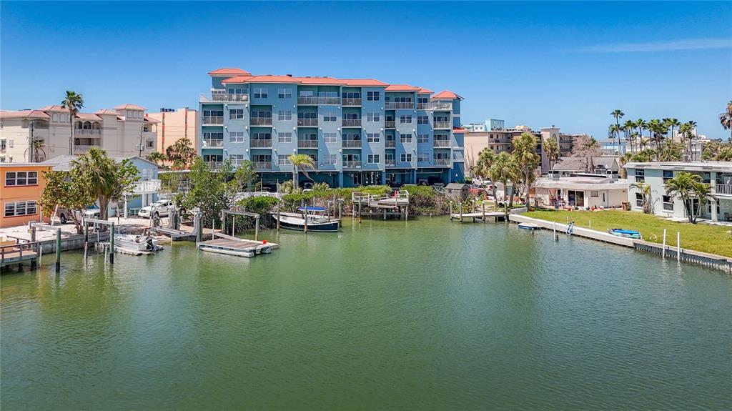 13999 Gulf Boulevard, Unit 501 Madeira Beach, FL 33708 - Photo 56 of 58 a view of ocean with residential building and lake view