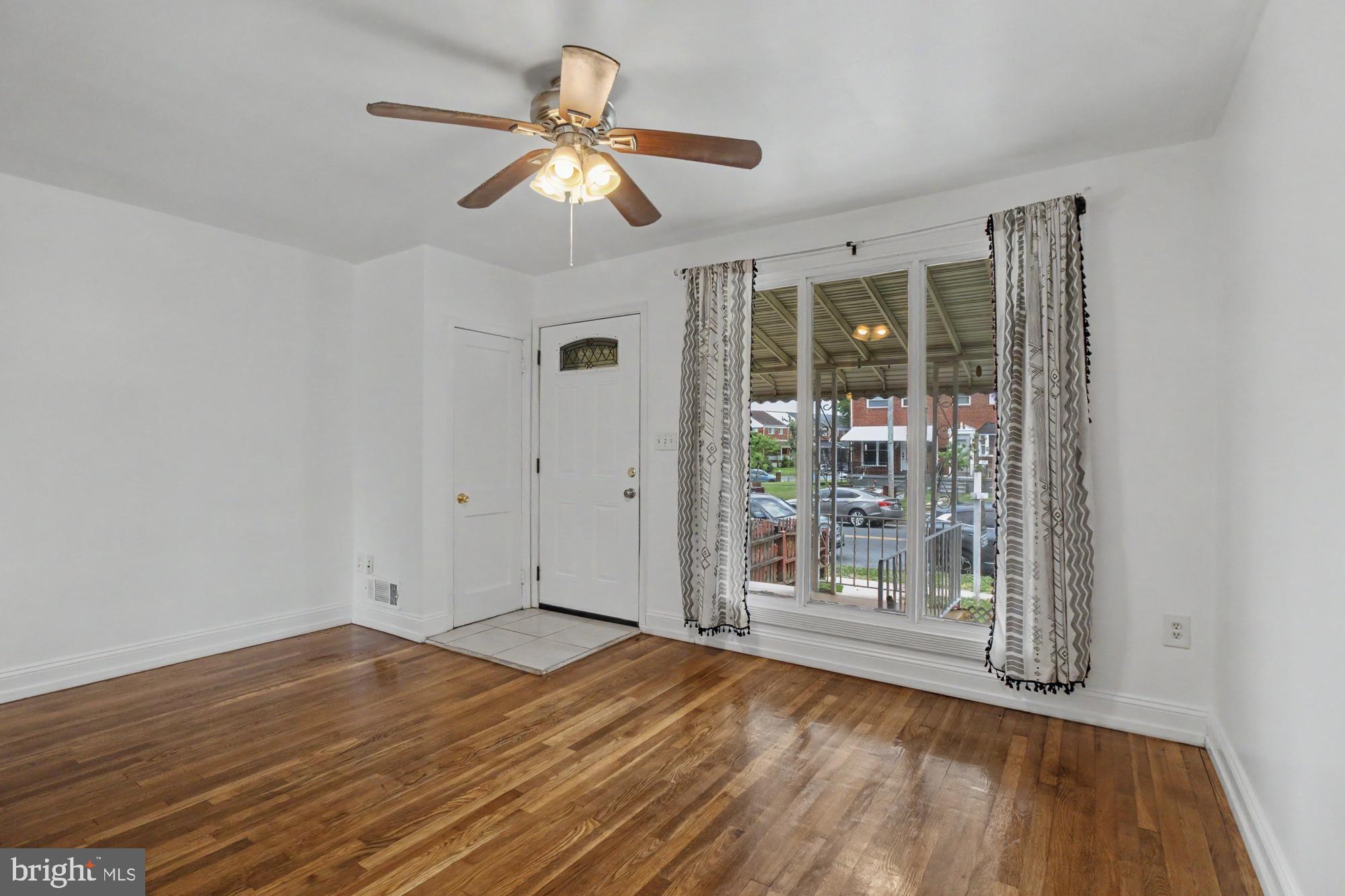 8218 Kavanagh Road Dundalk, MD 21222 - Photo 9 of 39 Bright and airy living space awaits!