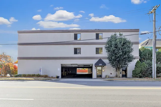 front view of a house with a street