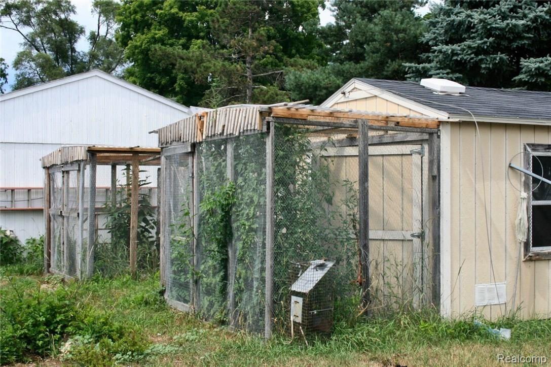 9022 Parshallville Road Fenton, MI 48430 - Photo 17 of 17 Multiple sheds behind garage