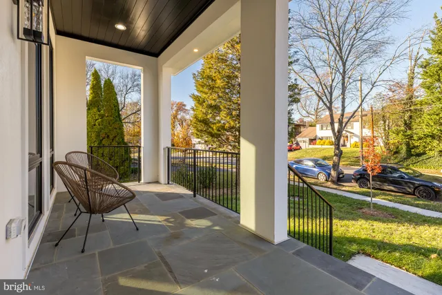 a view of balcony with furniture