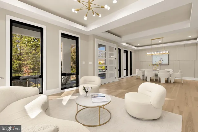 a kitchen with stainless steel appliances granite countertop a sink and a white cabinets