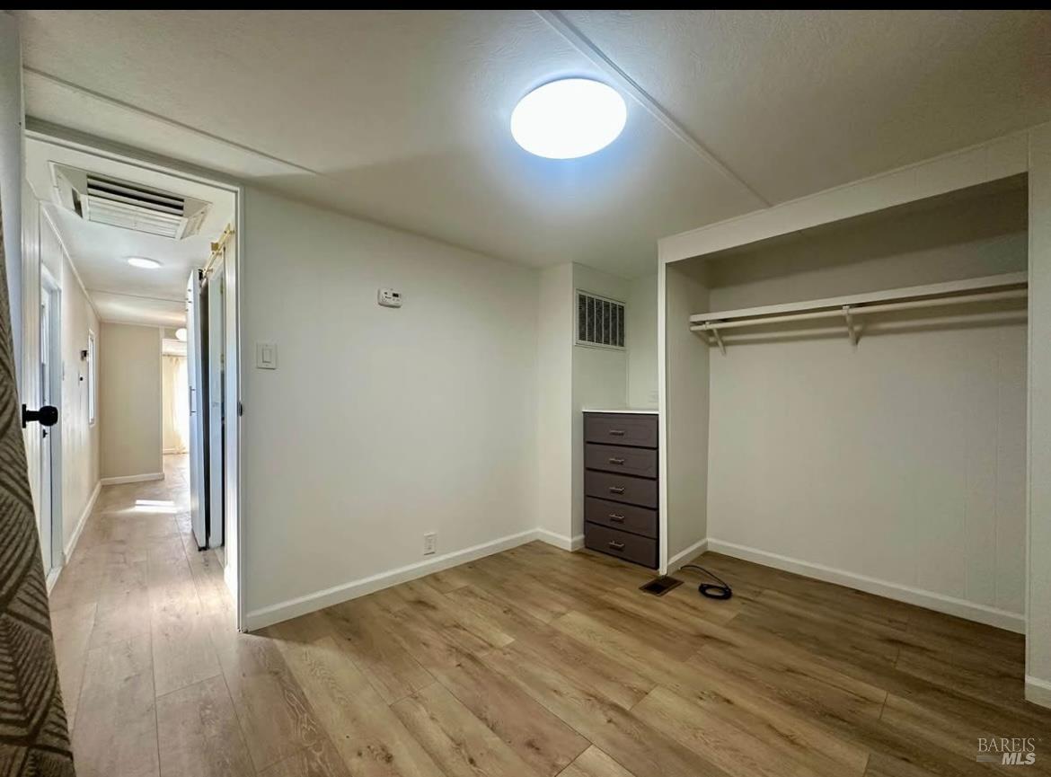7 Geneseo Street Oakley, CA 94561 - Photo 7 of 9 a view of empty room with wooden floor