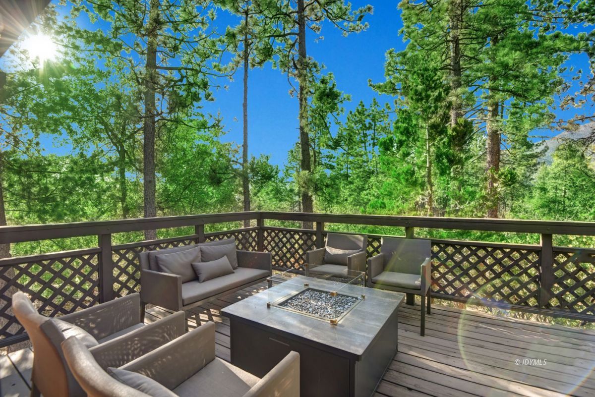 26780 Saunders Meadow Road Idyllwild, CA 92549 - Photo 13 of 41 a view of a balcony with furniture
