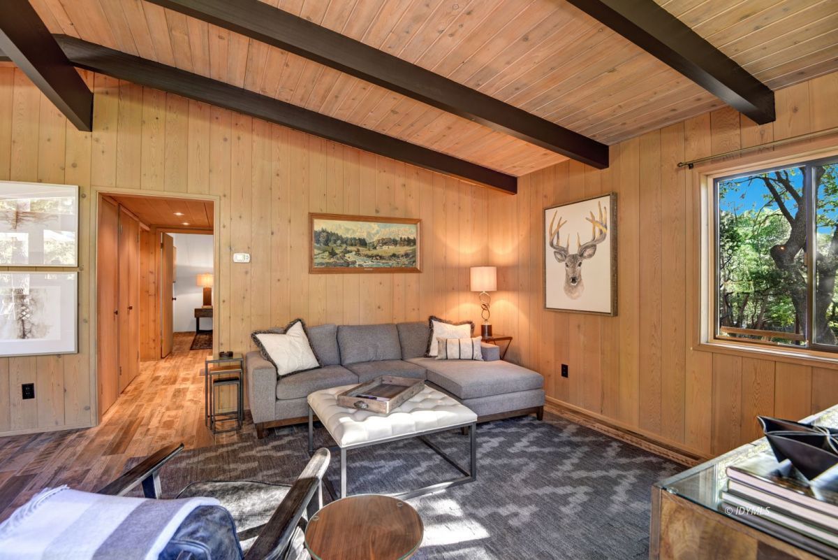 26780 Saunders Meadow Road Idyllwild, CA 92549 - Photo 23 of 41 a living room with furniture and a window