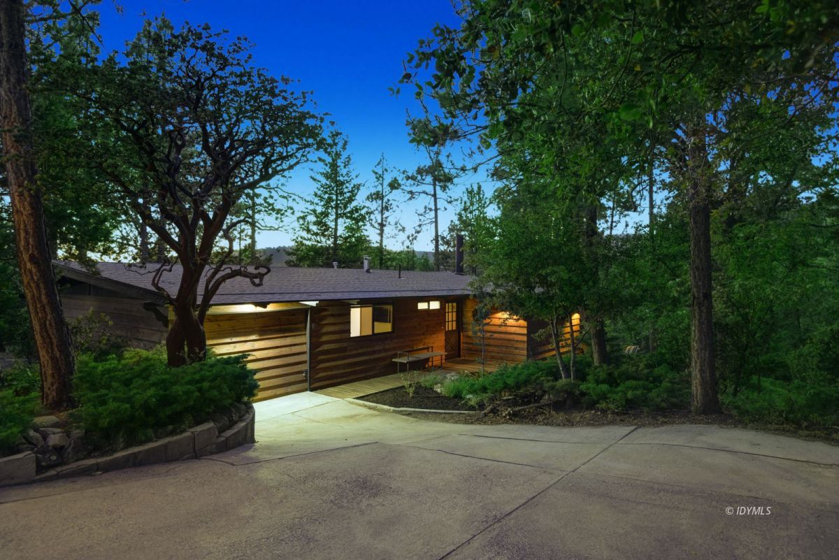 26780 Saunders Meadow Road Idyllwild, CA 92549 - Photo 3 of 41 a front view of a house with a yard