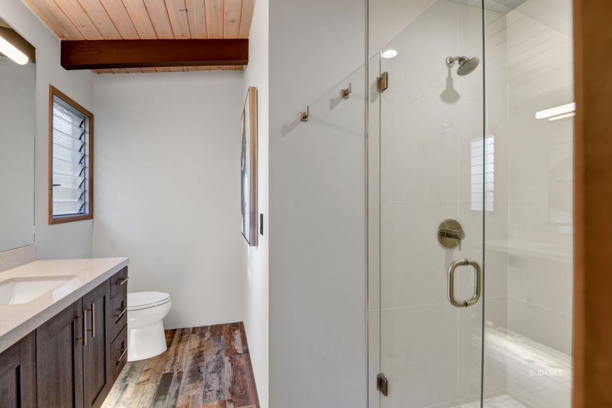 26780 Saunders Meadow Road Idyllwild, CA 92549 - Photo 35 of 41 a bathroom with a sink a toilet and shower