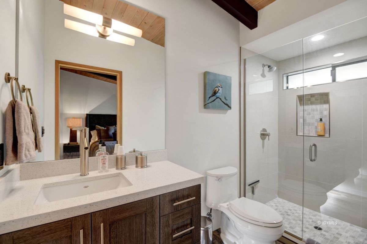 26780 Saunders Meadow Road Idyllwild, CA 92549 - Photo 39 of 41 a bathroom with a sink a toilet a mirror and shower