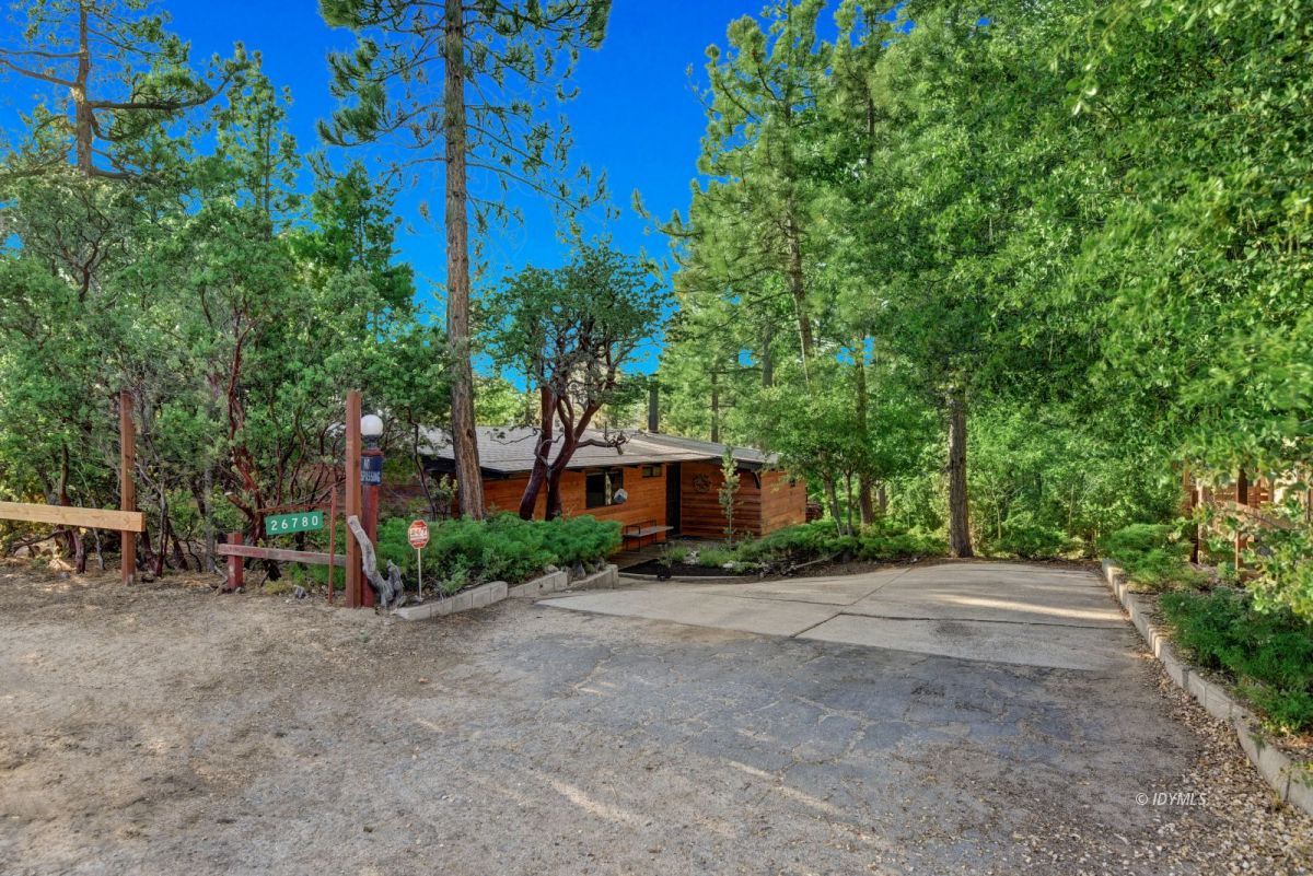 26780 Saunders Meadow Road Idyllwild, CA 92549 - Photo 9 of 41 a view of house with outdoor space and trees around
