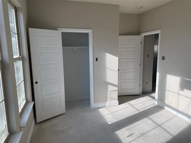 an empty room with windows