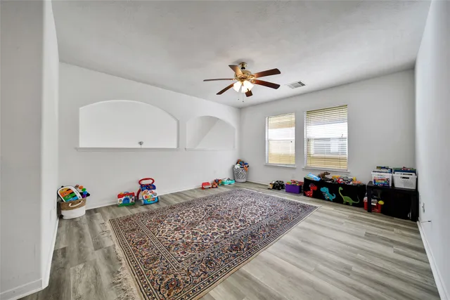 a view of a hallway with a workspace