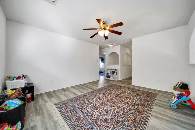 a bathroom with a sink a toilet a shower and a mirror