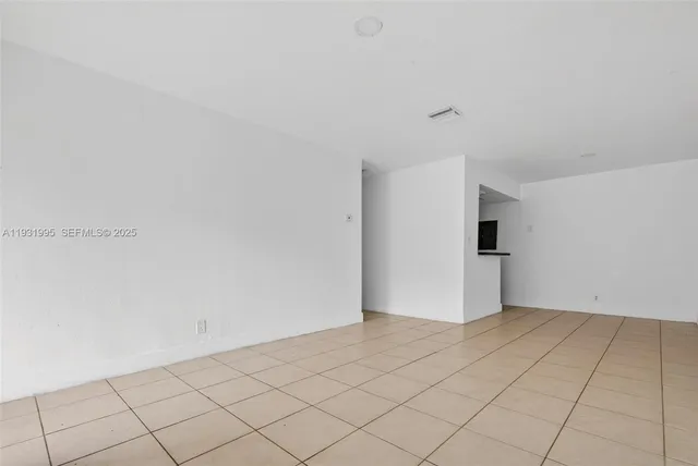 a view of a room with a window