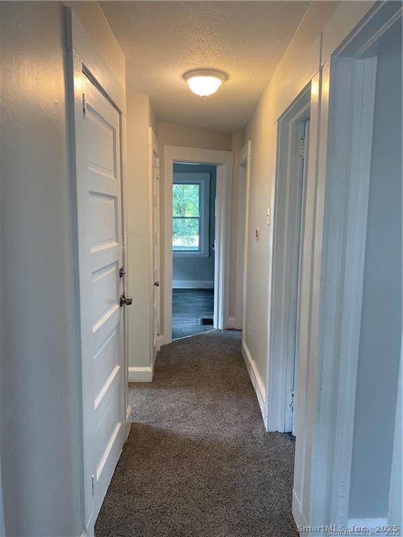 79 North Pond Street Bristol, CT 06010 - Photo 5 of 13 a view of a hallway