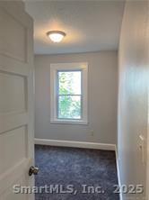 79 North Pond Street Bristol, CT 06010 - Photo 10 of 13 an empty room with a window